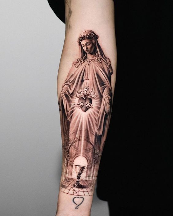 Saint Mary tattoo on siderib by Didson Scripts