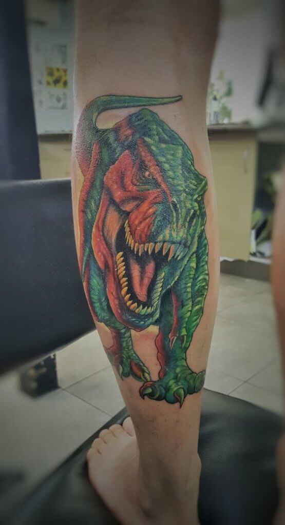 T-rex calf tattoo