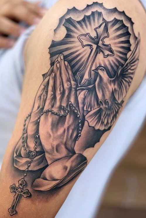 Meaning of praying hands tattoo and some examples 4