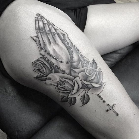 Meaning of praying hands tattoo and some examples 5