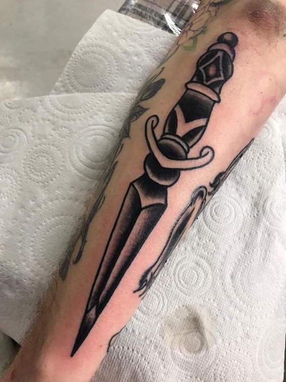 Meaning of sword and dagger tattoos also some ideas 7