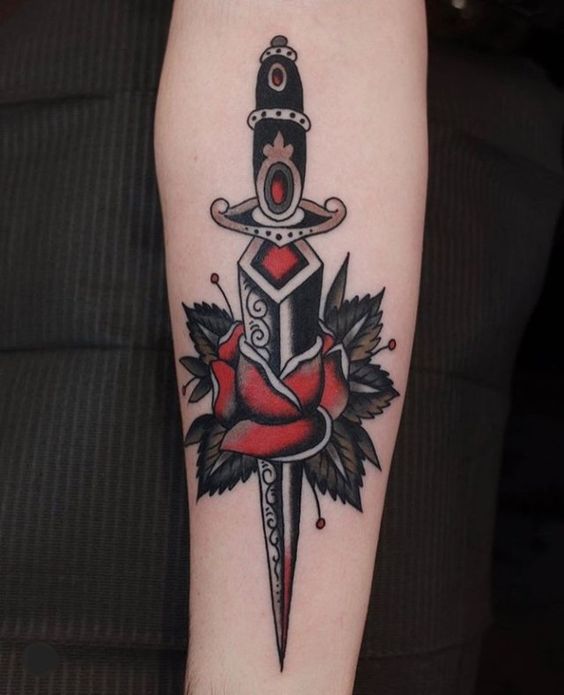 Meaning of sword and dagger tattoos also some ideas 9