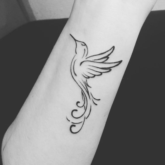 Photos of marvelous hummingbird outline tattoos we have seen this year