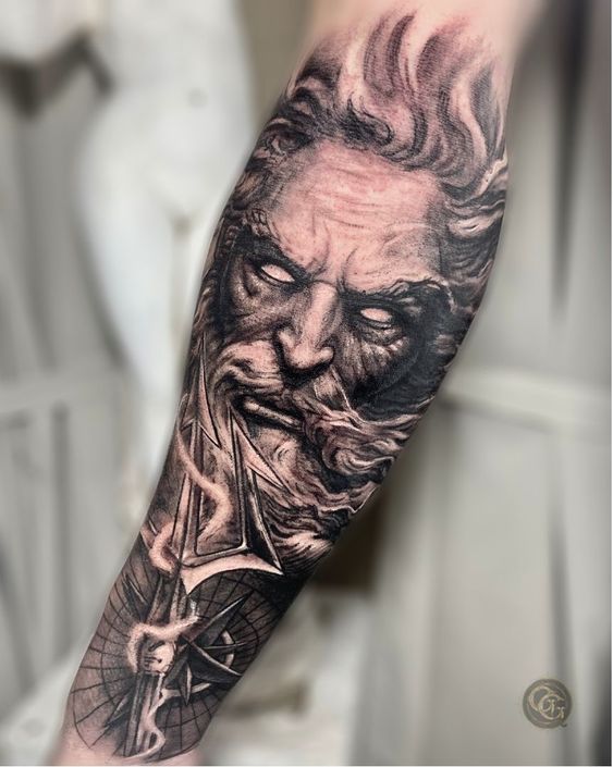Realistic Poseidon portrait tattoo on the forearm