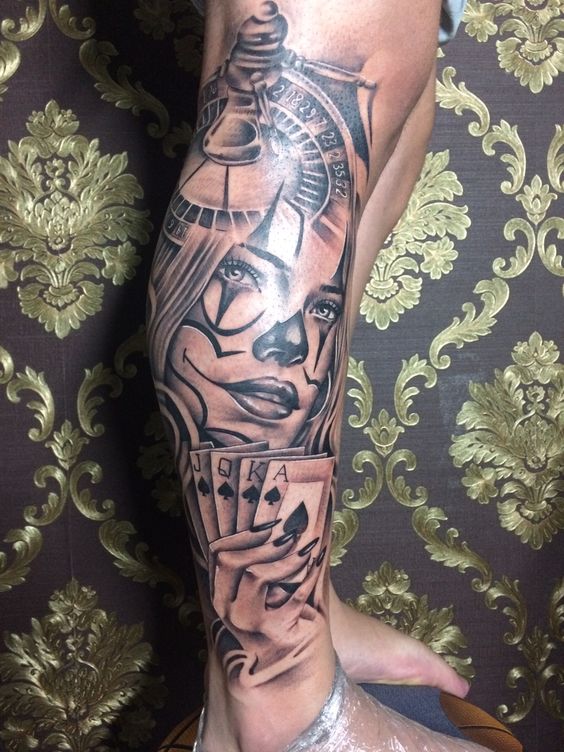 Calf Chicano tattoo with gambling motive