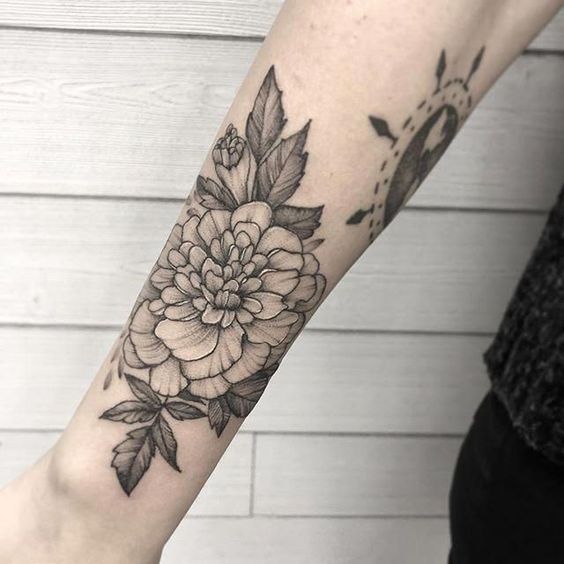 Meaning of Marigold tattoo: The Symbolism and Beauty