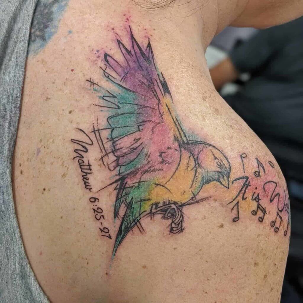 watercolor sparrow shoulder tattoo