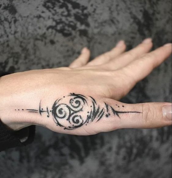 Interesting examples of Triskele tattoo