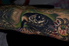 Black mamba color tattoos must look scary
