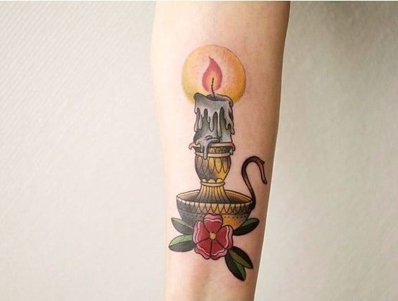 Flicker of tradition, candle tattoos that light the way in 20 ideas