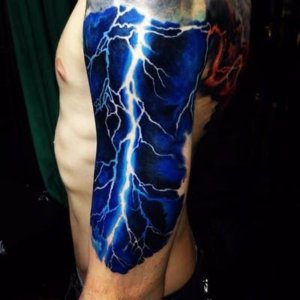 Realistic lightning striking shoulder tattoo design 2