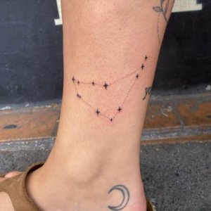 Why not try these amazing Capricorn stars constellation tattoos 4