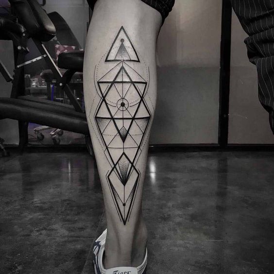 15 Symmetrical geometric calf tattoos as a perfectly balanced design