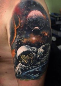 15 galactic ideas with astronaut tattoos featuring the beauty of the universe 13
