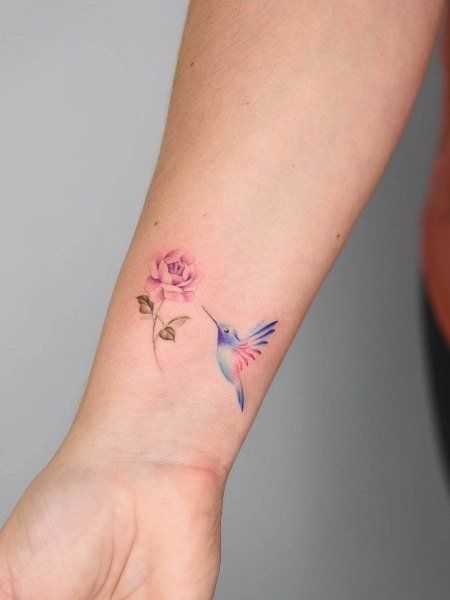 Astonish hummingbird tattoo on the wrist for a subtle statement