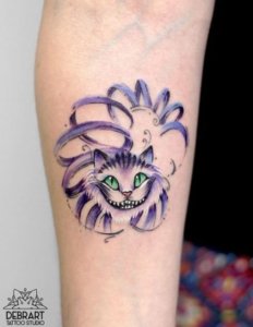 Meaning and symbolism of Cheshire cat tattoo 3