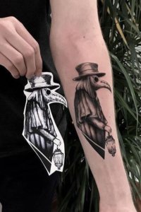 Meaning and symbolism of Plague Doctor tattoo 1