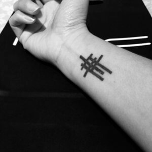 Meaning of 3 cross tattoo 7