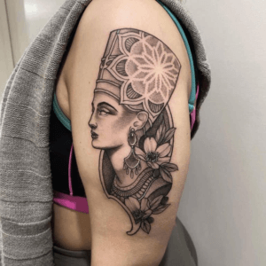 The alluring Nefertiti tattoo on your shoulder 4