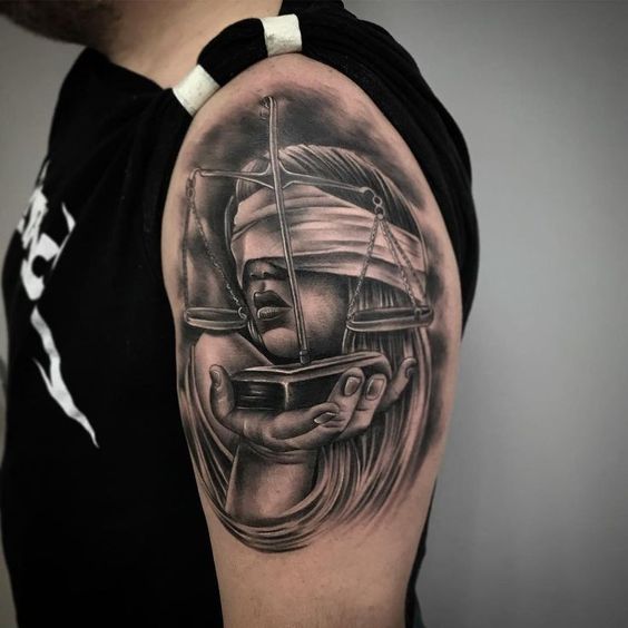 lady justice chest tattoo