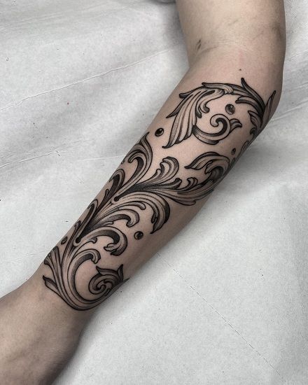 10 delightful design vintage filigree tattoo on forearm