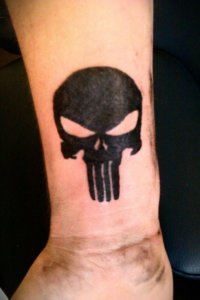 10 forearm Punisher skull tattoos that commands respect 2