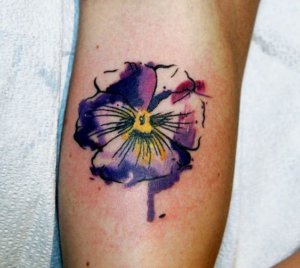 A beautiful and unique designs of watercolor Violet flower tattoos 5