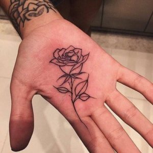 A symbol of love and passion as rose tattoo on the palm in 10 examples 8