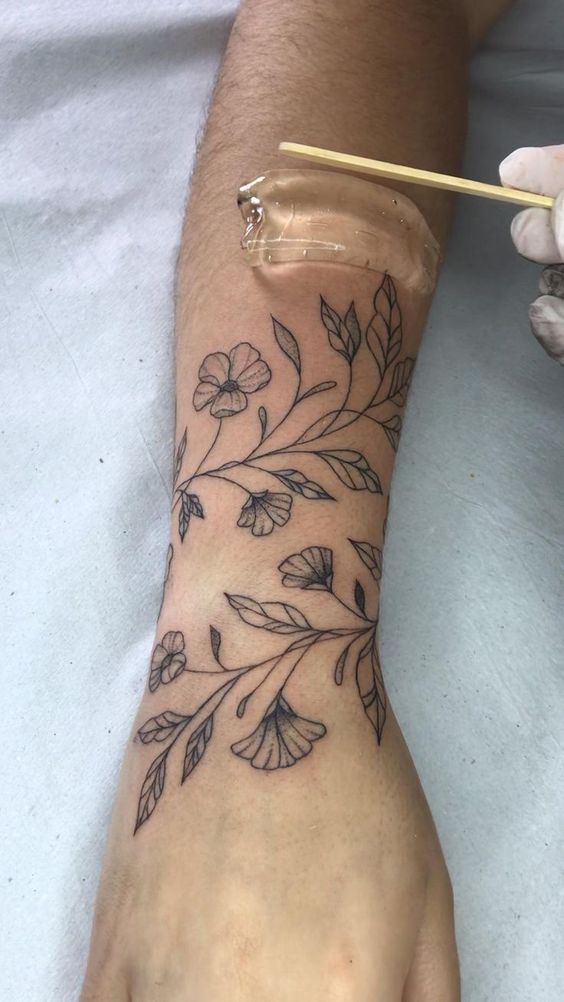 Elegant vine tattoo on the wrist in 10 ideas