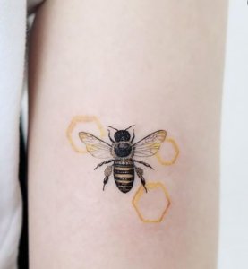 Less is more Minimalist honeycomb tattoo design 1