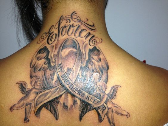 Lettering and empowering message as is “My Brother’s Keeper” tattoo for female