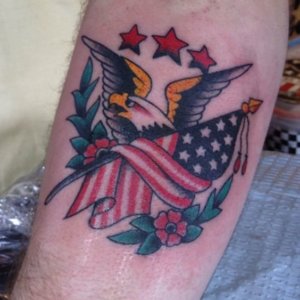 See a timeless and powerful design in traditional eagle tattoo 6