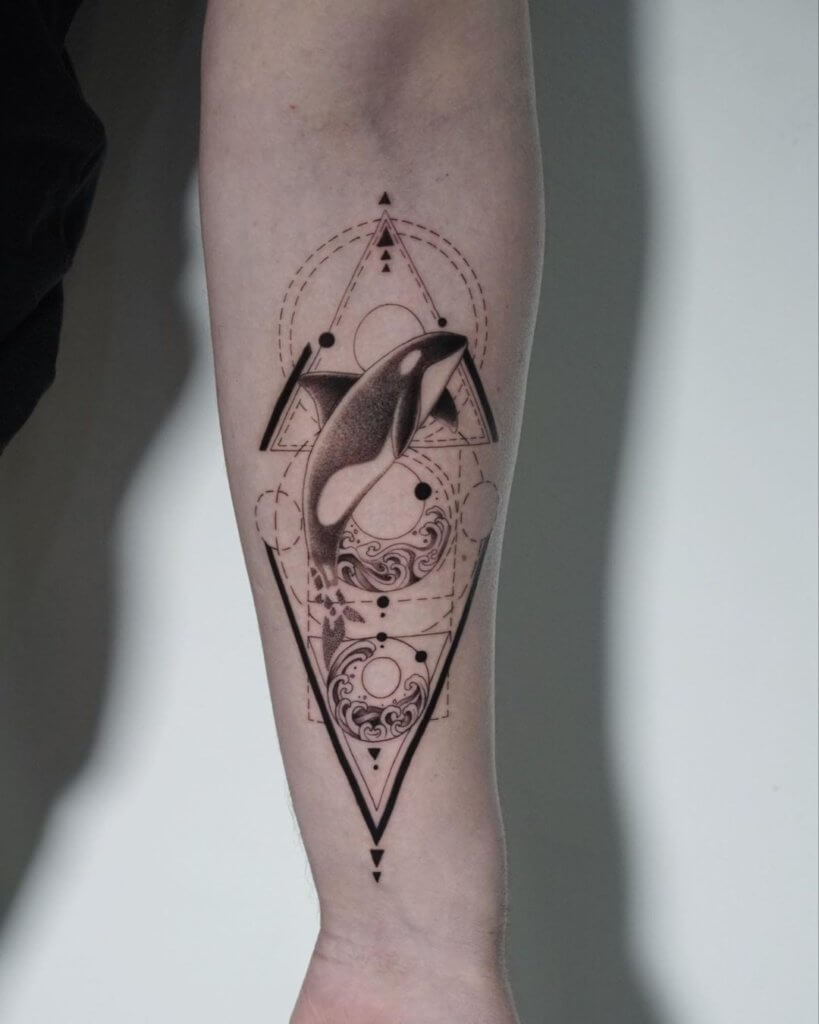 The art of capturing the majestic Orca in geometric tattoos