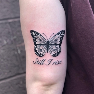Transforming adversity: The symbolism of the Still I Rise butterfly tattoo