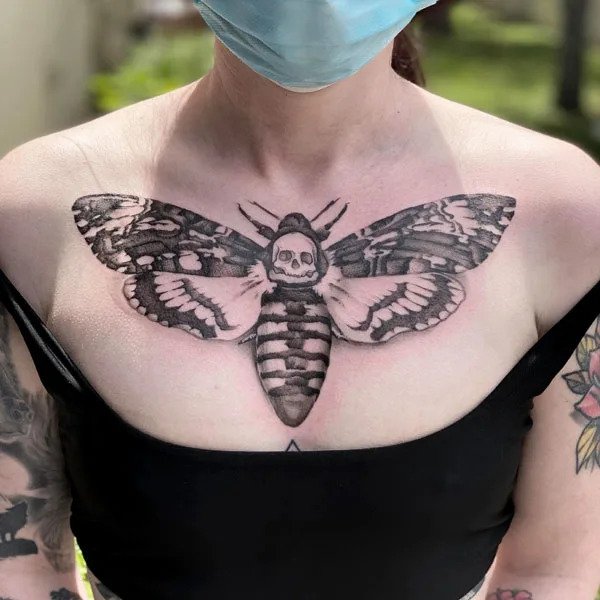 15 stunning death moth chest tattoo designs to inspire your next ink