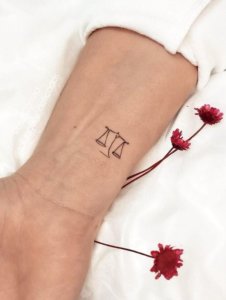 Finding balance with this 10 simple Libra tattoos 1