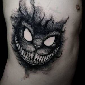 Ink madness in as 15 dark Cheshire Cat tattoos 11