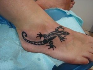 Lizard tribal tattoos Incorporating natures patterns into body art 5