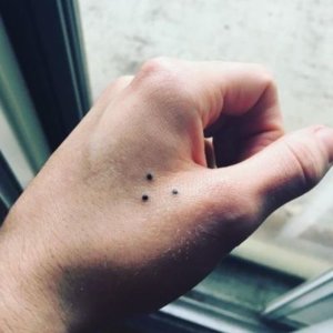 Meaning of 3 dots tattoo 2