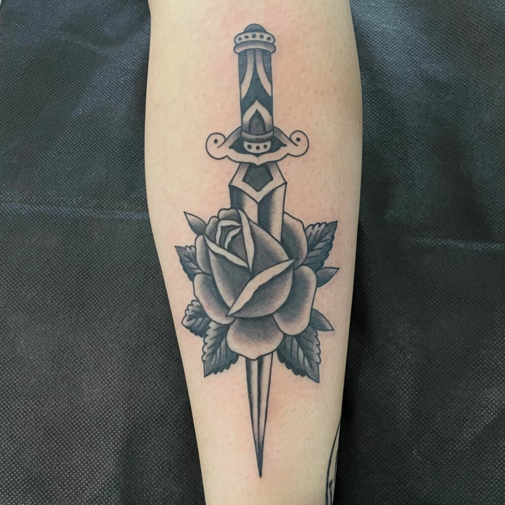 Meaning of Rose Pierced by a Dagger Tattoo: Why It’s Popular Among Convicted Prisoners