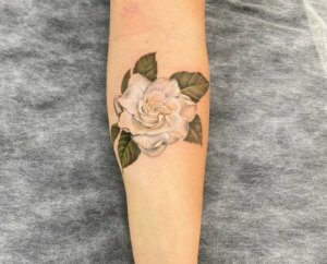 The beauty and symbolism of a forearm Gardenia tattoo 2