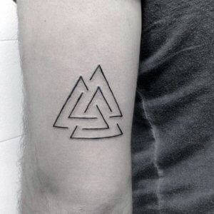 The simple Valknut tattoo an ancient Norse symbol of mystery 5