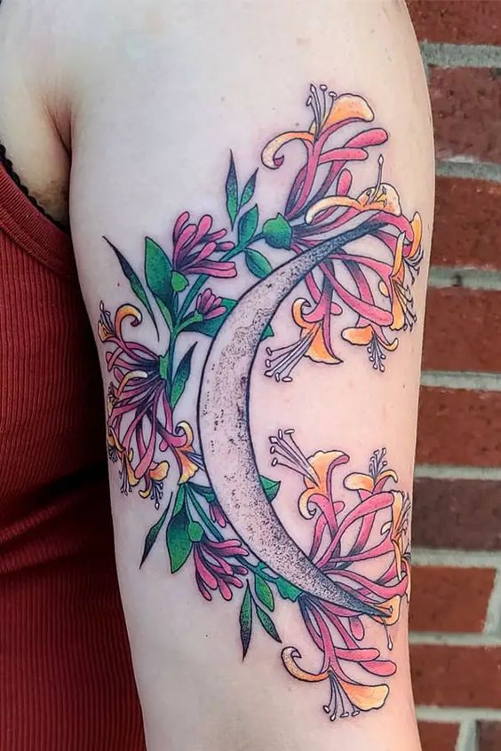 Exquisite moon honeysuckle arm tattoo artwork symbolizing the deep emotions of love and the magnetic charm of sweet attraction.