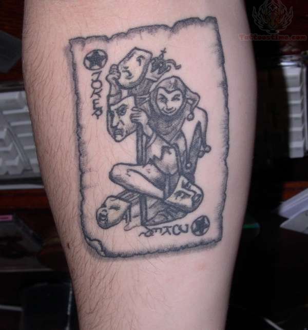 Dynamic Joker card calf tattoo artwork emphasizing the elements of risk, the spirit of rebellion, and the unpredictable essence of the Joker card.