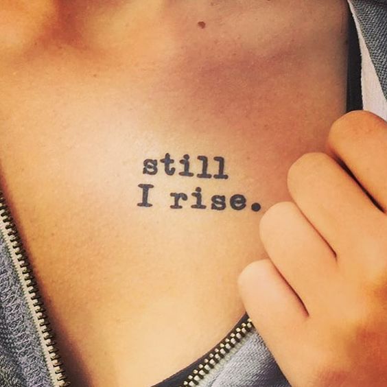 Elegant 'Still I Rise' chest tattoo design, emphasizing resilience and the power of perseverance.