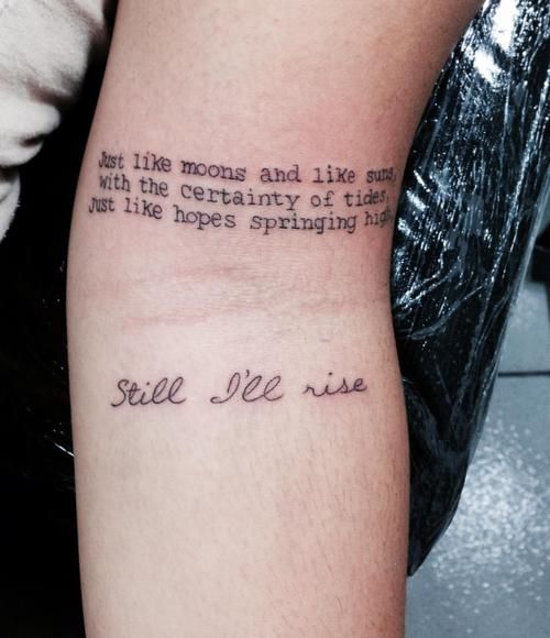 Inspirational 'Still I Rise' arm tattoo artwork, symbolizing strength, determination, and the will to overcome challenges.