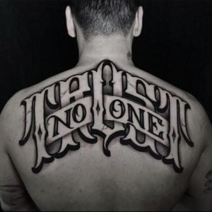 Trust No One lettering men tattoos with deep meaning 2