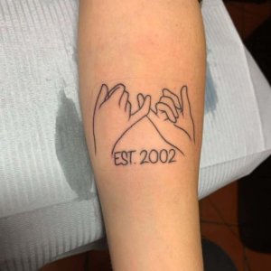 Minimalist Pinky Promise forearm Tattoo Idea