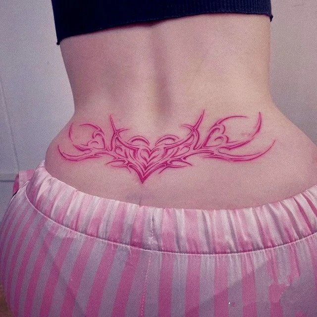 lower back pink succubus tattoo