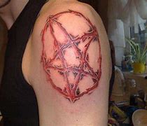 Upside Down Pentagram tattoo